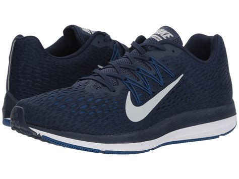 navy blue nike sneakers.